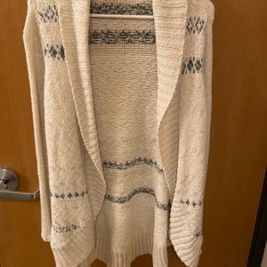 Cream cardigan with blue-green designs